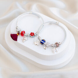 PULSERA DE ACERO BLANCO TIPO PANDORA CON VARIOS DIJES