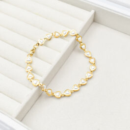 PULSERA DE ACERO DORADO 5  CORAZONES C/NACAR
