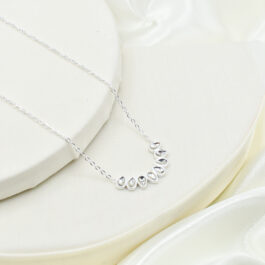 COLLAR DE ACERO BLANCO C/8 GOTAS DE STRASS Y ALARGUE