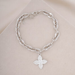 PULSERA PLATEADA  C/DIJE DE STRASS TIPO FLOR
