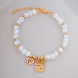 PULSERA/TOBILLERA DORADA DE PERLAS C/DIJES Y ALARGUE