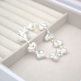 PULSERA DE ACERO BLANCO INFLADOS EN FORMA DE CORAZON