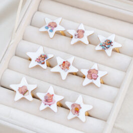 ANILLO DE ACERO DORADO DE ESTRELLA C/CAPIBARA