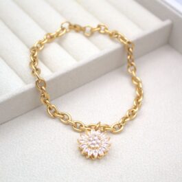 PULSERA DE ACERO DORADO FORCE REDONDEADA  C/DIJE GIRATORIO