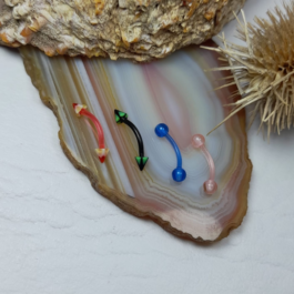 PIERCING P/CEJA DE SILICONA COLORES