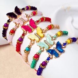 PULSERAS MACRAME Y ACERO DORADO MARIPOSAS