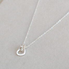 COLLAR ACERO BLANCO DONA Y CORAZON MULTISTRASS ENTRELAZADOS