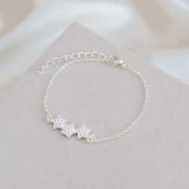 PULSERA DE ACERO BLANCO C/DIJE MULTISTRASS EN MEDIO