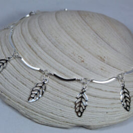 PULSERA DE ACERO BLANCO ARTICULADA C/HOJAS O CORAZONES