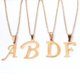 DIJE DE ACERO DORADO INICIAL