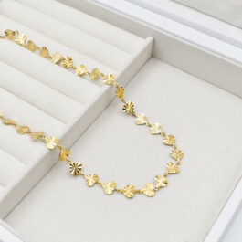 CADENA DE ACERO DORADO CORAZON FACETADO 50CM