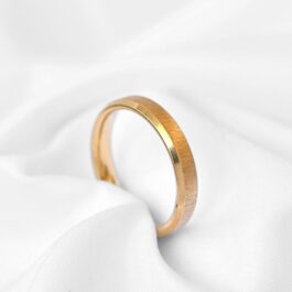 ALIANZA DE ACERO DORADO FACETADA 4MM