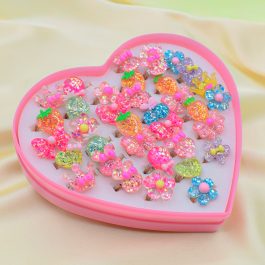 ANILLOS DE FANTASIA PARA NENA X36 MODELO FLORES CON BRILLITOS