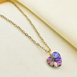 COLLAR DE ACERO DORADO C/DIJE CRISTAL SWAROSVKY LILA