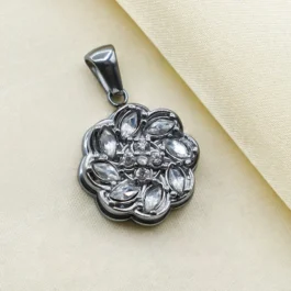 DIJE PLATEADO GIRATORIO (ANTI STRESS) FLOR DE 8 PETALOS