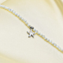 PULSERA DE ACERO Y CRISTAL C/ DIJE ESTRELLA DE MAR