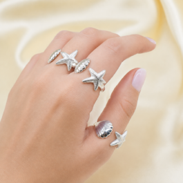 ANILLO PLATEADO C/ ESTRELLA DE MAR Y OSTRA REGULABLE X3