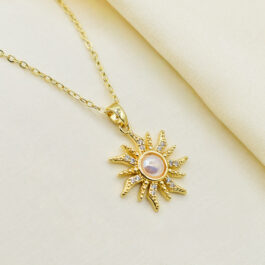 COLLAR DE ACERO DORADO SOL CON PERLA