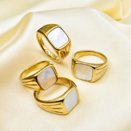 ANILLO DE ACERO DORADO C/ PIEDRA TIPO NACAR X4