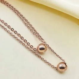 COLLAR DE ACERO ROSE DOBLE CON BOLITA Y/O CORAZON