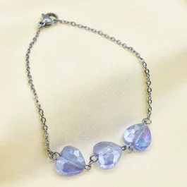 PULSERA DE ACERO 3 CORAZONES CRISTAL COLOR VIOLETA