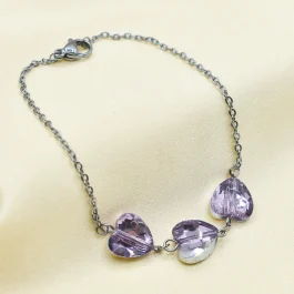 PULSERA DE ACERO 3 CORAZONES CRISTAL COLOR VIOLETA OSCURO