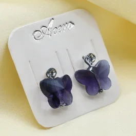 ARO DE ACERO PASANTE C/MARIPOSA DE CRISTAL COLOR VIOLETA