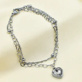 PULSERA DE ACERO DOBLE CADENA C/ DIJES Y BOLITAS