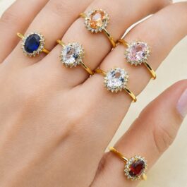 ANILLO DORADO TIPO GIRASOL C/CUBIC EN MEDIO X6
