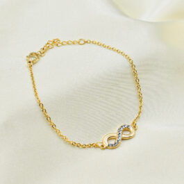 PULSERA DE ACERO DORADO INFINITO STRASS EN MEDIO