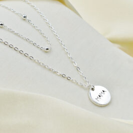 COLLAR DE ACERO BLANCO DOBLE C/ BOLITAS  Y DIJE MAMA