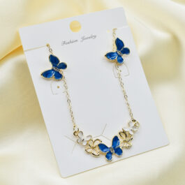 CONJUNTO DE ACERO DORADO MARIPOSA AZUL