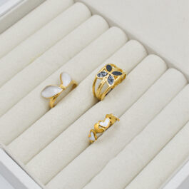 ANILLO DE ACERO DORADO ABIERT ESM BLANCO/NEGRO VARIOS MOD X6