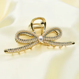 BROCHE DORADO MOÑO C/ PERLAS Y STRASS