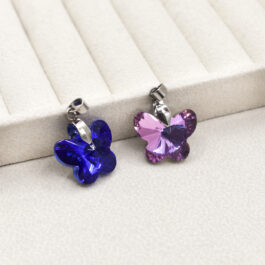 DIJE DE ACERO VARIAS FORMAS TIPO CRISTAL DE ROCA MARIPOSA