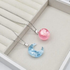 COLLAR DE ACERO CIELITO QUE BRILLA SOLO CIELO ROSA