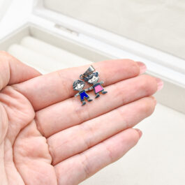 DIJE DE ACERO 2 NENITOS/AS ESMALTADO NENA Y NENE