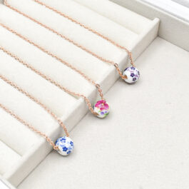 COLLAR  DE ACERO ROSE C/ DONA DE CERAMICA