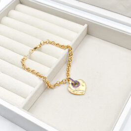 PULSERA DE ENCHAPADO AMERICANO ROLO C/CORAZON LISO C/PIEDRA BORGOÑA