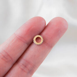 DIJE ORO 14K DONA C/ZIRCON TIPO RUEDA