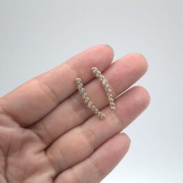 ARO BAÑO EN ORO 14K TREPADOR C/ZIRCON PASANTE