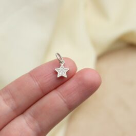 DIJE DE PLATA ESTRELLA CHICA C/ 6 CUBIC