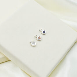 DIJE DE PLATA CORAZON C/CUBIC DE COLOR VILOLA