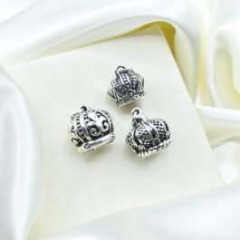DIJE DE PLATA INFLADA CORONA C/ PUNTOS Y FLORES