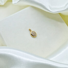 DIJE BAÑO EN ORO 18K  OVAL TIPO BOTON C/ZIRCON
